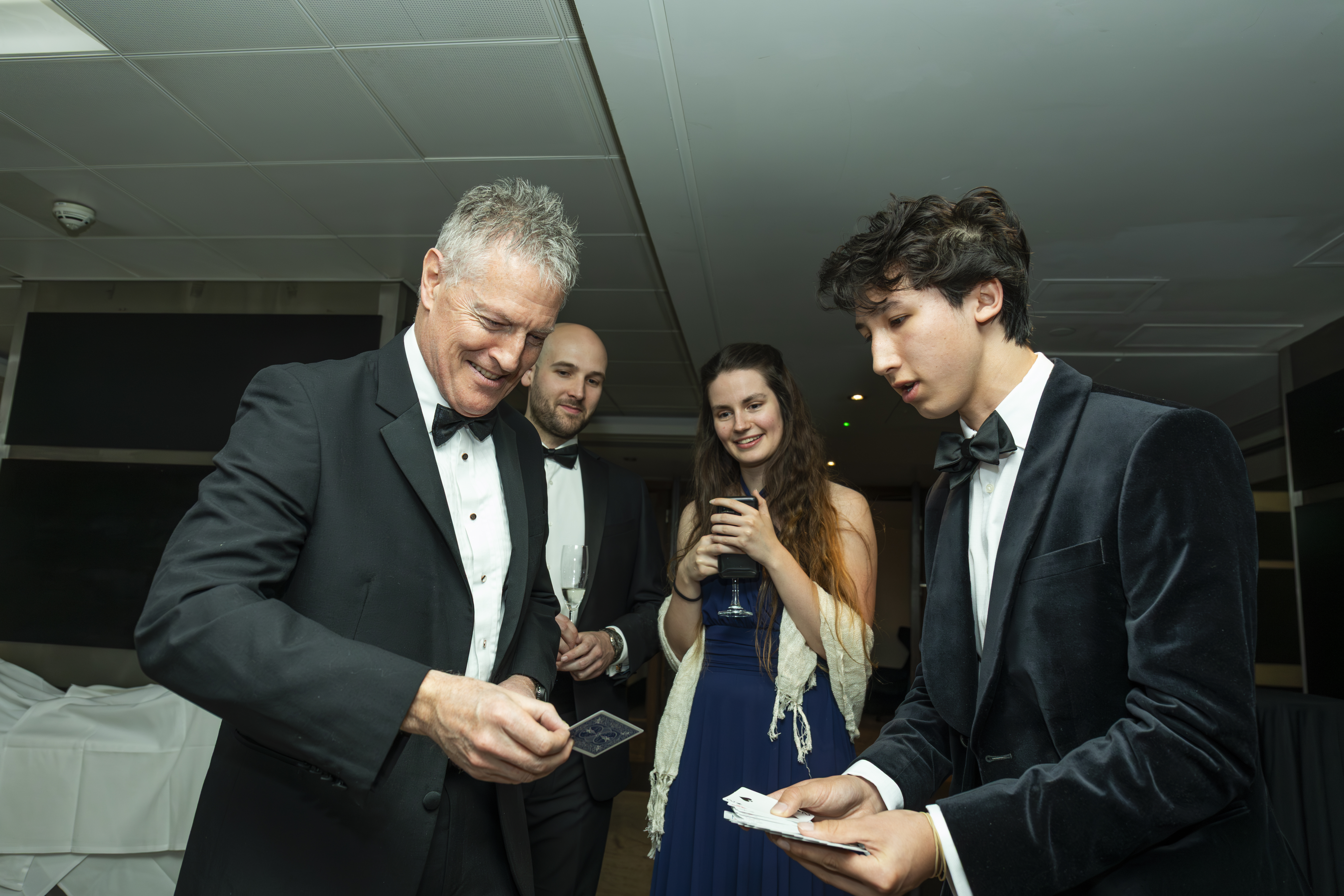 A reaction during a close-up magic routine